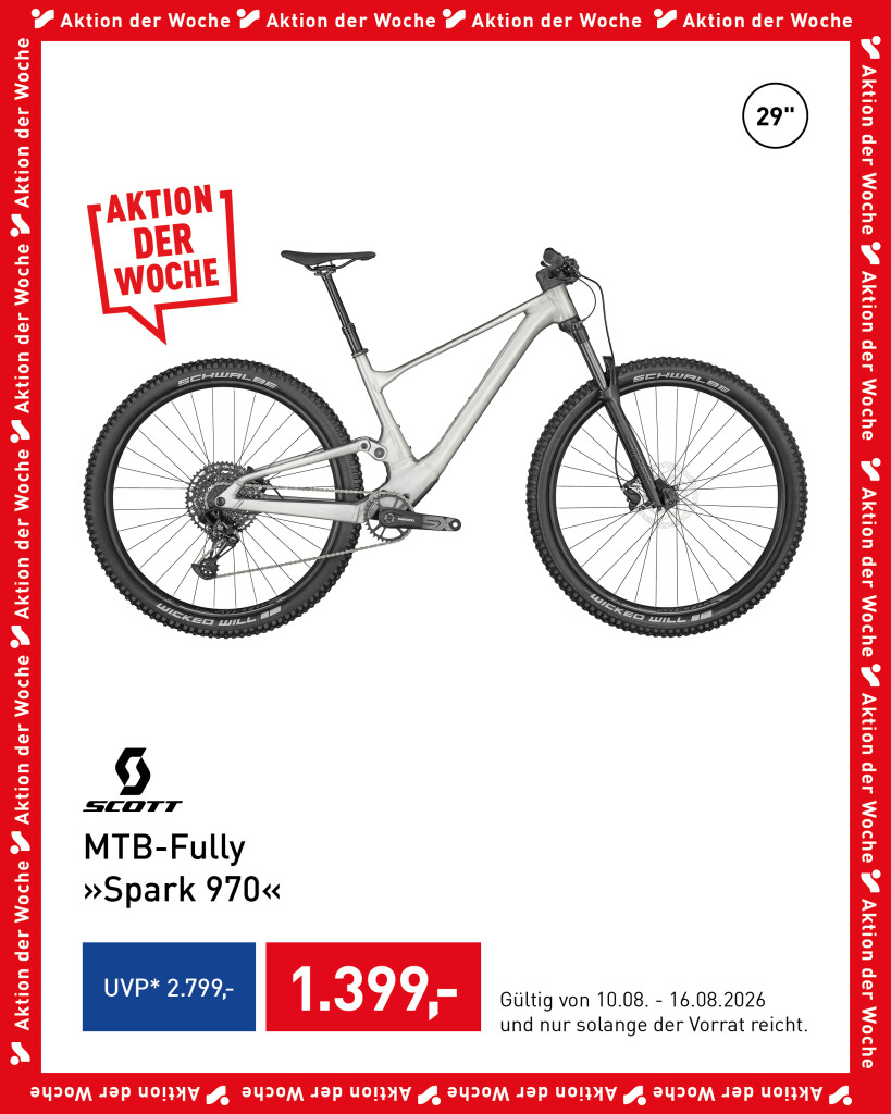 Silver full-suspension mountain bike with black tires and components, ready for off-road trails.